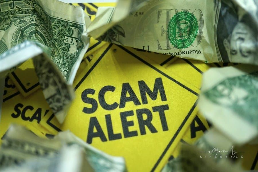 Scam Alert Sign with Money
