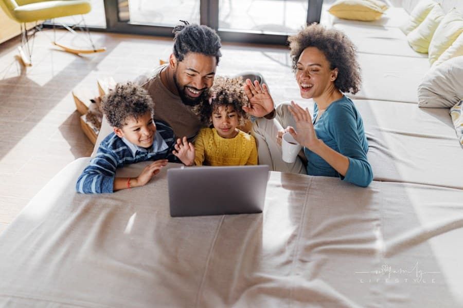 Family Video Calling on Laptop in the Living Room