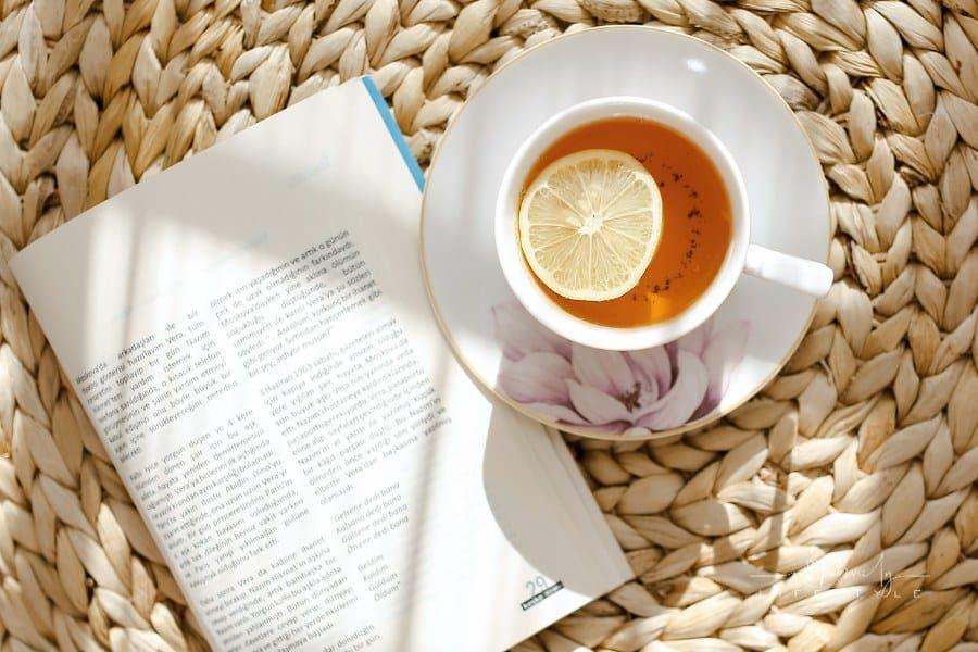 Book near cup of tea