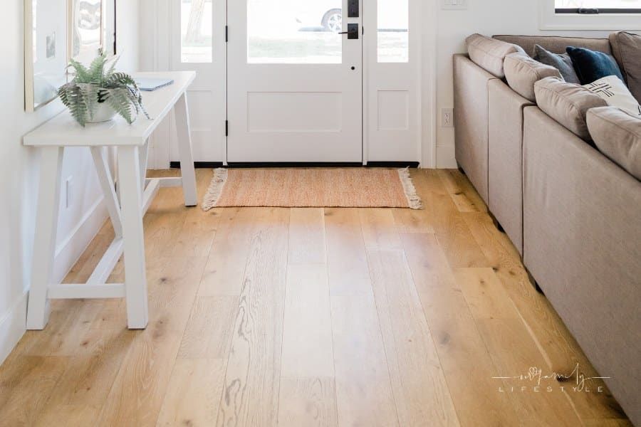 Doorway Interior of a Modern House with wood flooring and natural lighting