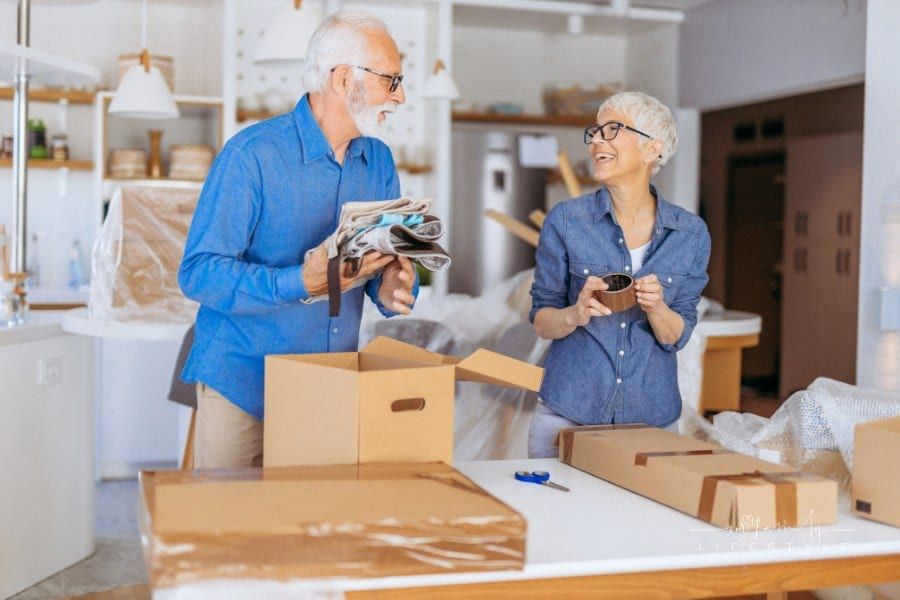 Senior couple moving to new home