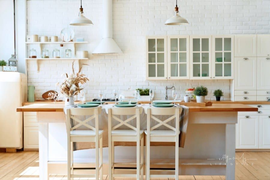 Modern white kitchen with kitchen island.