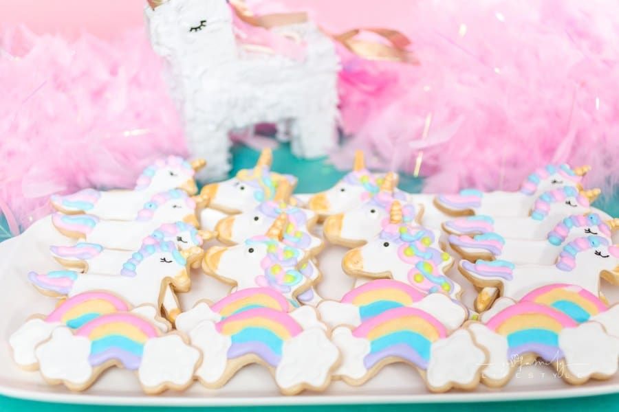 Unicorn sugar cookies decorated with royal icing at the kids birthday party.