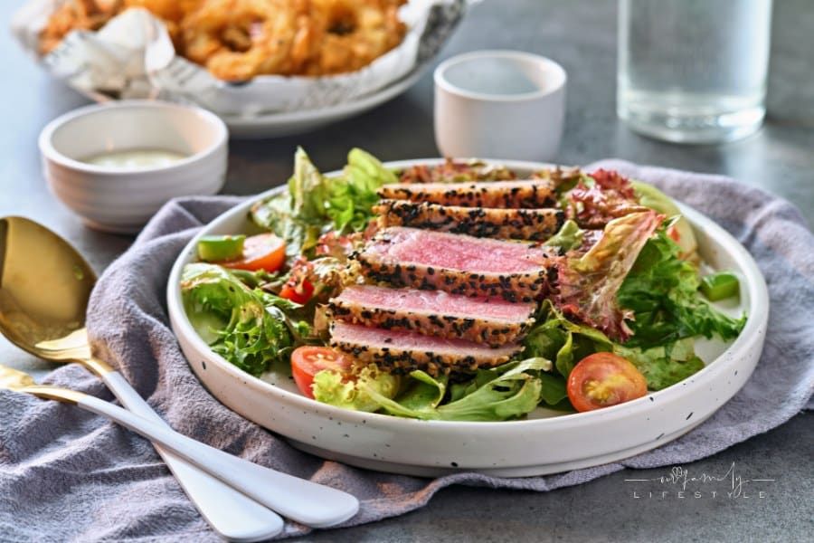seared ahi tuna tataki salad on plate
