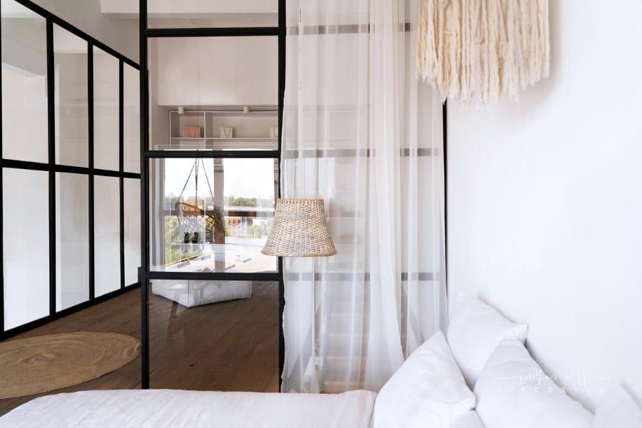 Bedroom interior design with room divider curtains