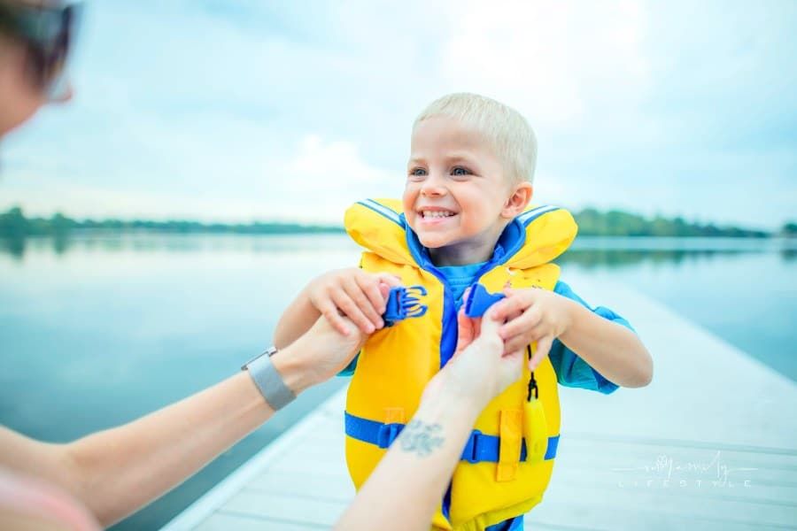 Young boy wearing a life jacket
