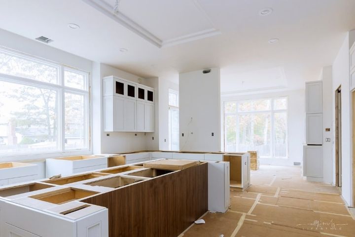 installation of new cabinets in a kitchen renovation
