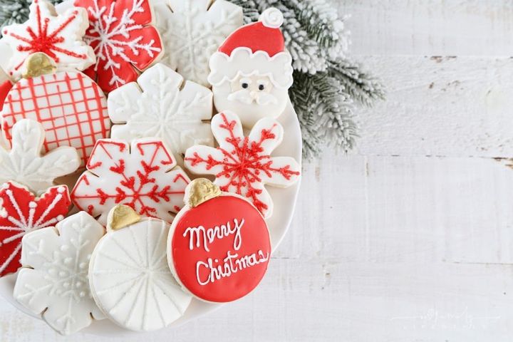 white Christmas cookies with red icing