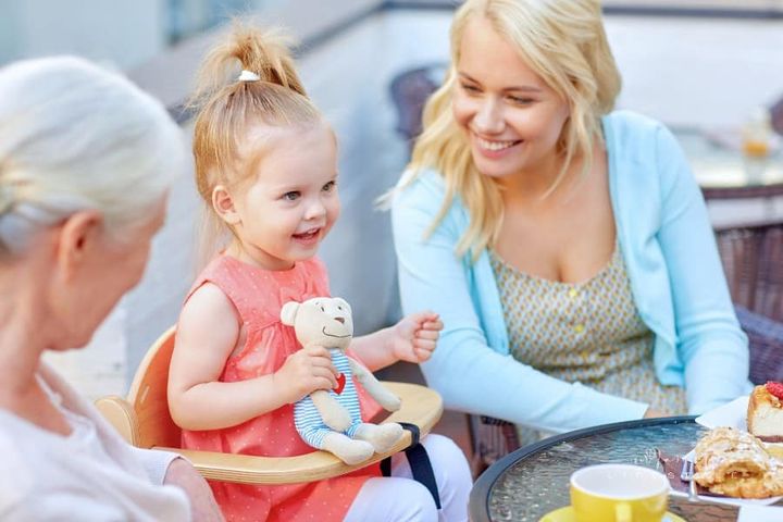 Mother, Daughter and Grandmother at Outdoor Cafe