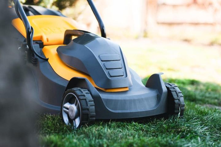 Electric Lawn Mower on Grass
