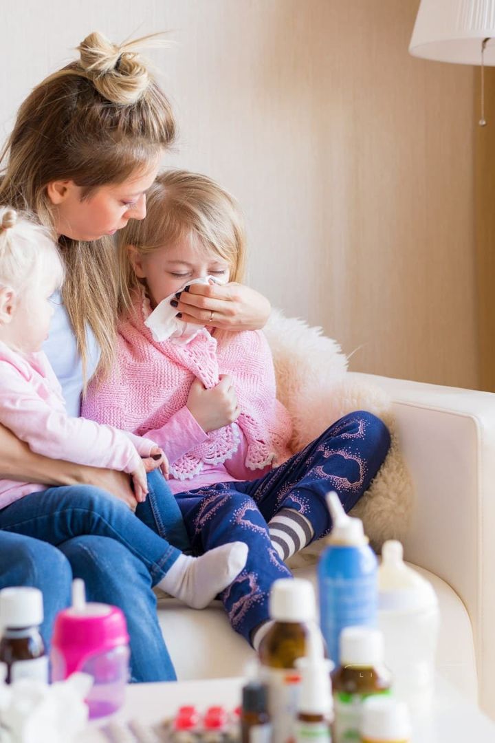 Mom Taking Care of Her Sick Children