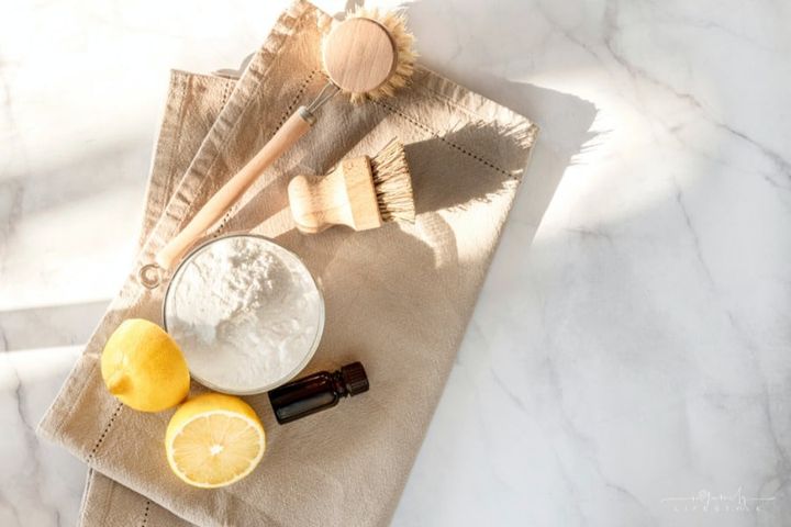 eco friendly kitchen cleaning tools and products, bamboo dish brushes, lemon, baking soda