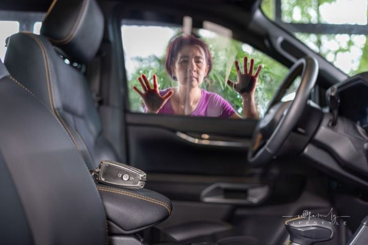 Senior woman forgot her key inside locked car.