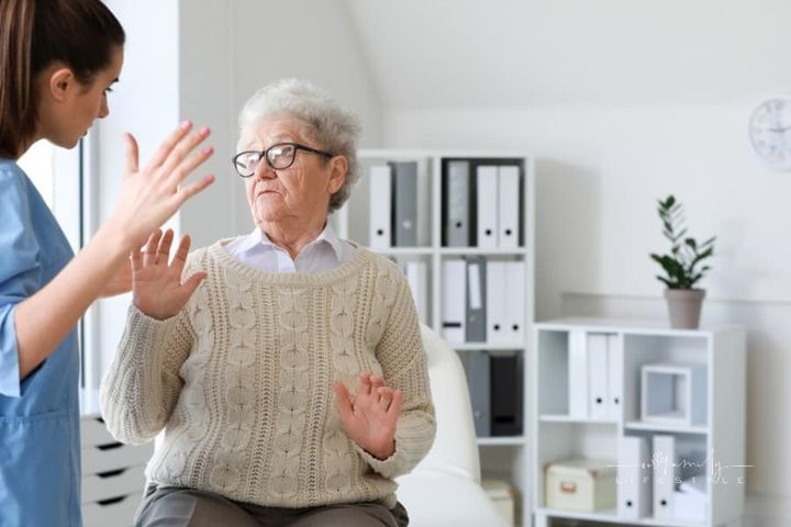 Medical Worker Mistreating Senior Woman in Nursing Home
