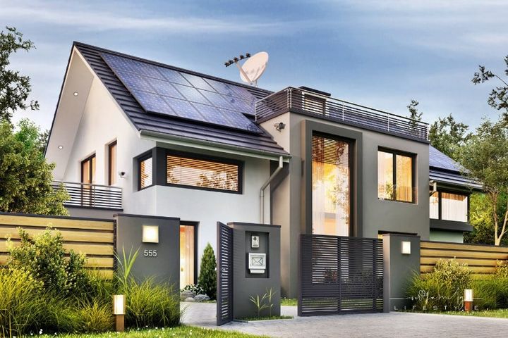 Modern house with garden and solar panels