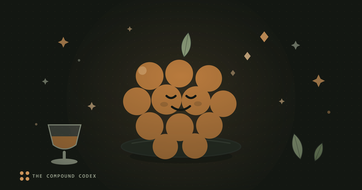 A friendly grape cluster on a pedestal, beside a glass of wine and vine leaves