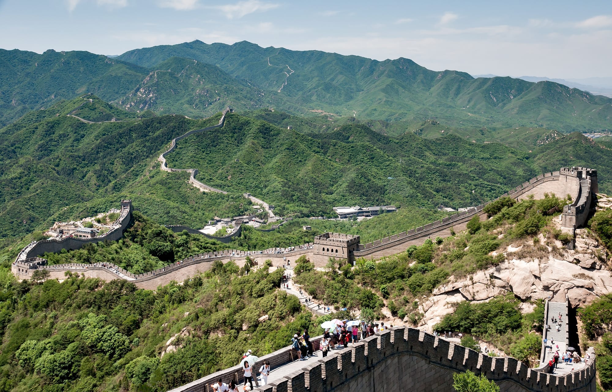 The Great Wall of China at Badaling climbing over wooded ridges