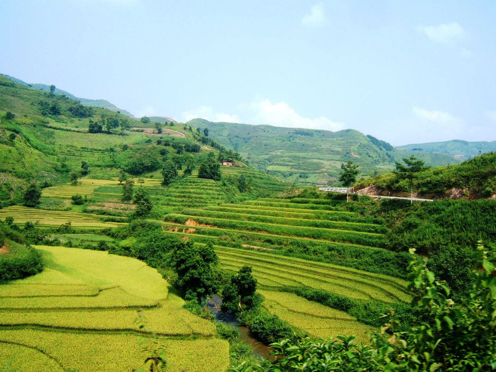 A mountain road winding through the highlands of northern Vietnam