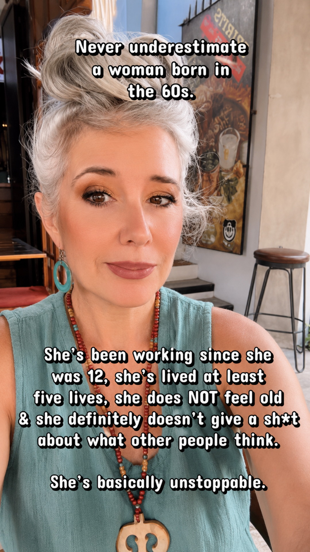 Roxanne Lynch wearing a teal top and silver messy bun, with text celebrating the strength and confidence of women born in the 1960s.