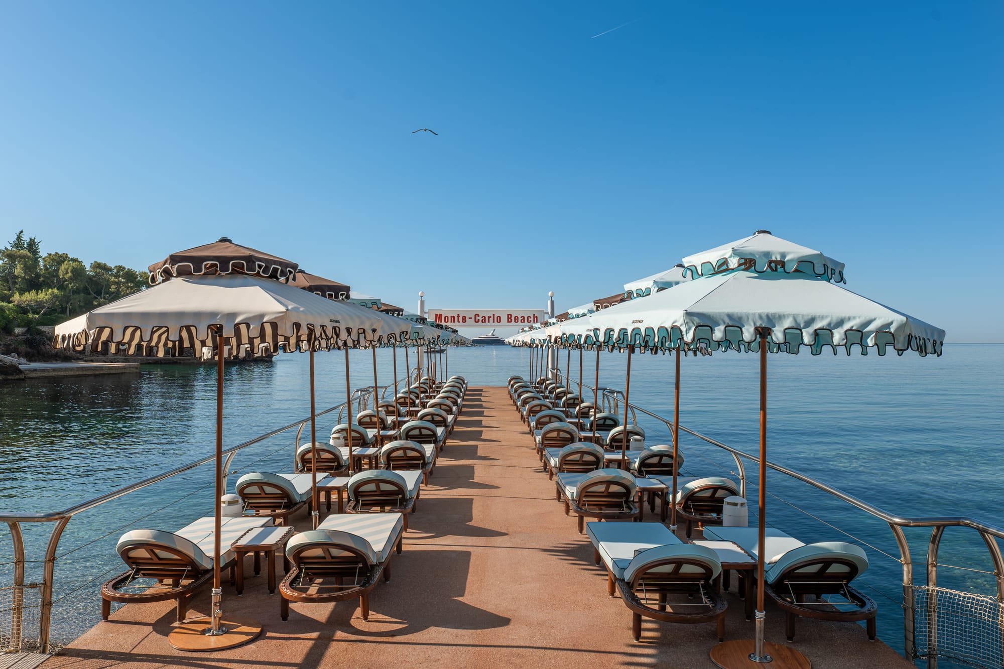 Jacquemus returns to Monte-Carlo Beach, where even the parasols have cheekbones