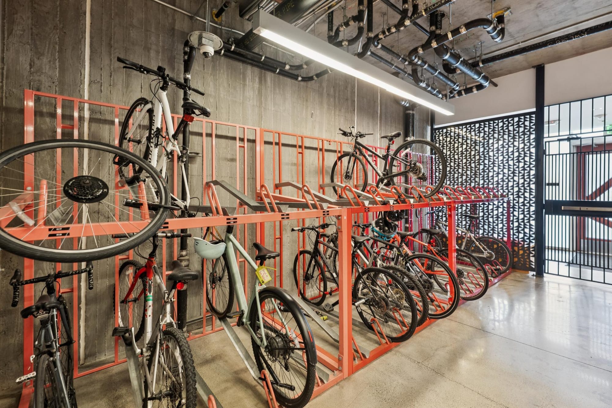 Bike room with two-tier racks at 388 Fulton