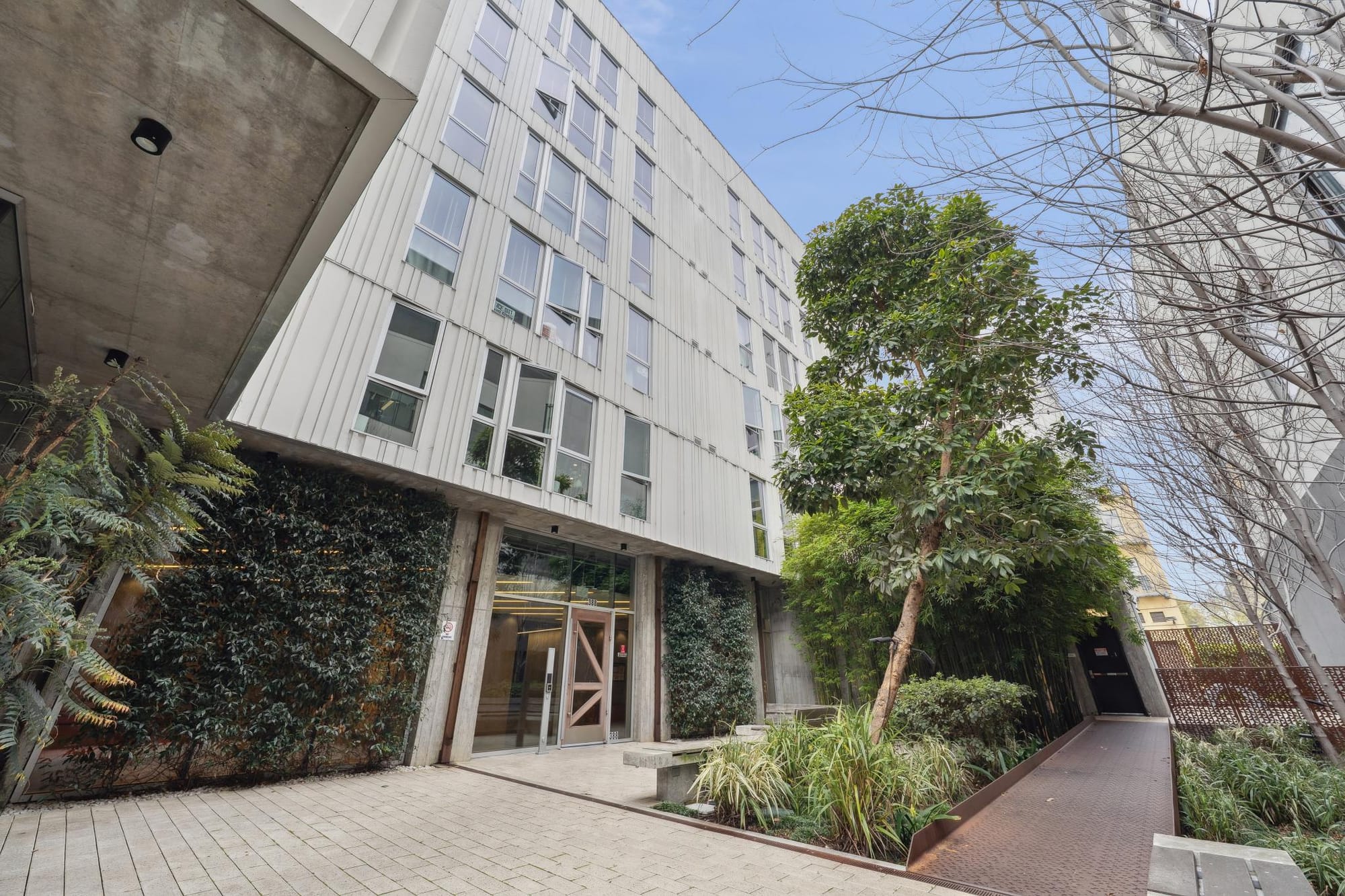 Courtyard and green wall at 388 Fulton