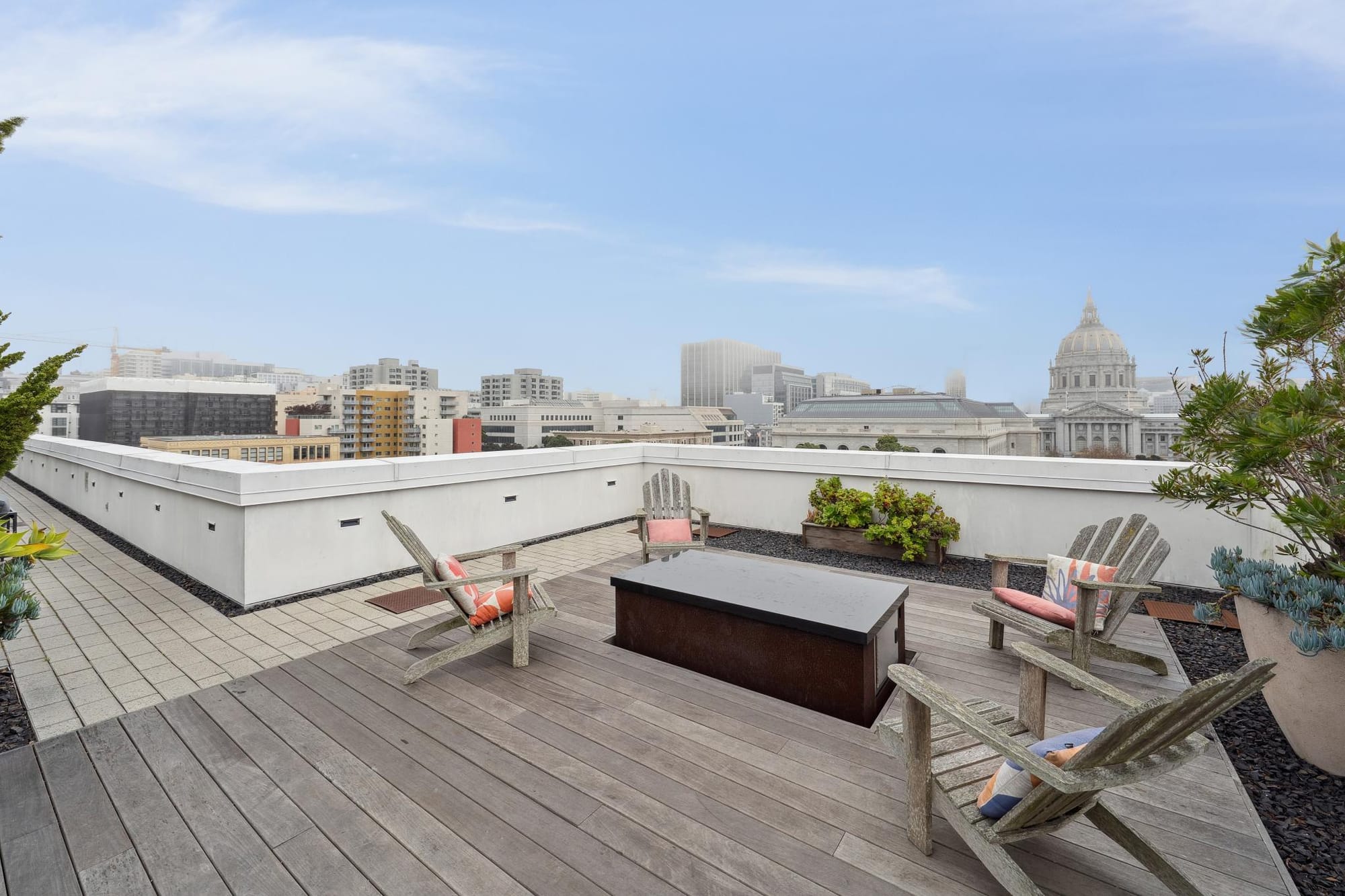 Rooftop fire pit and Adirondack chairs at 388 Fulton