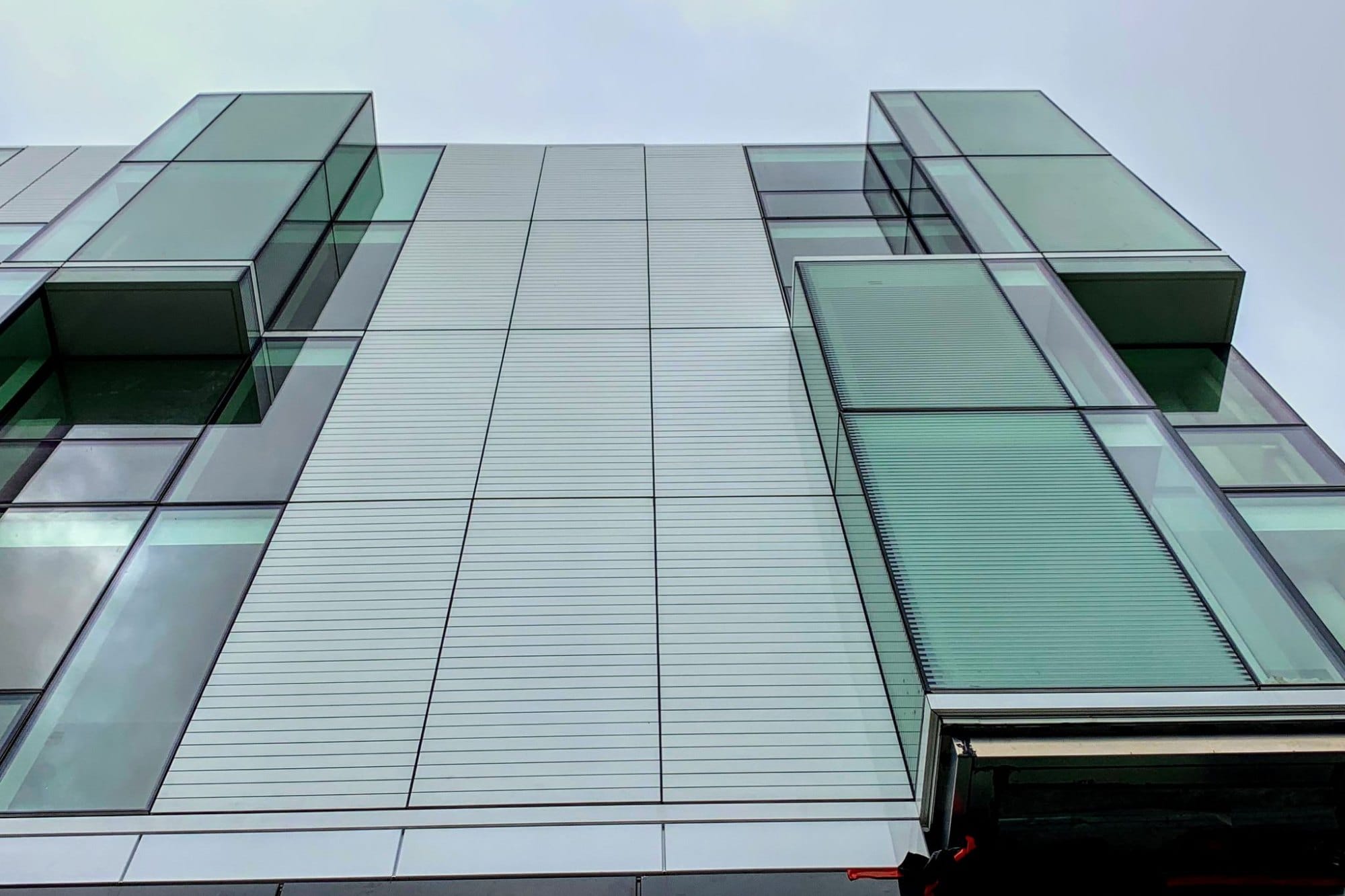 Glass bay windows on the 555 Fulton facade