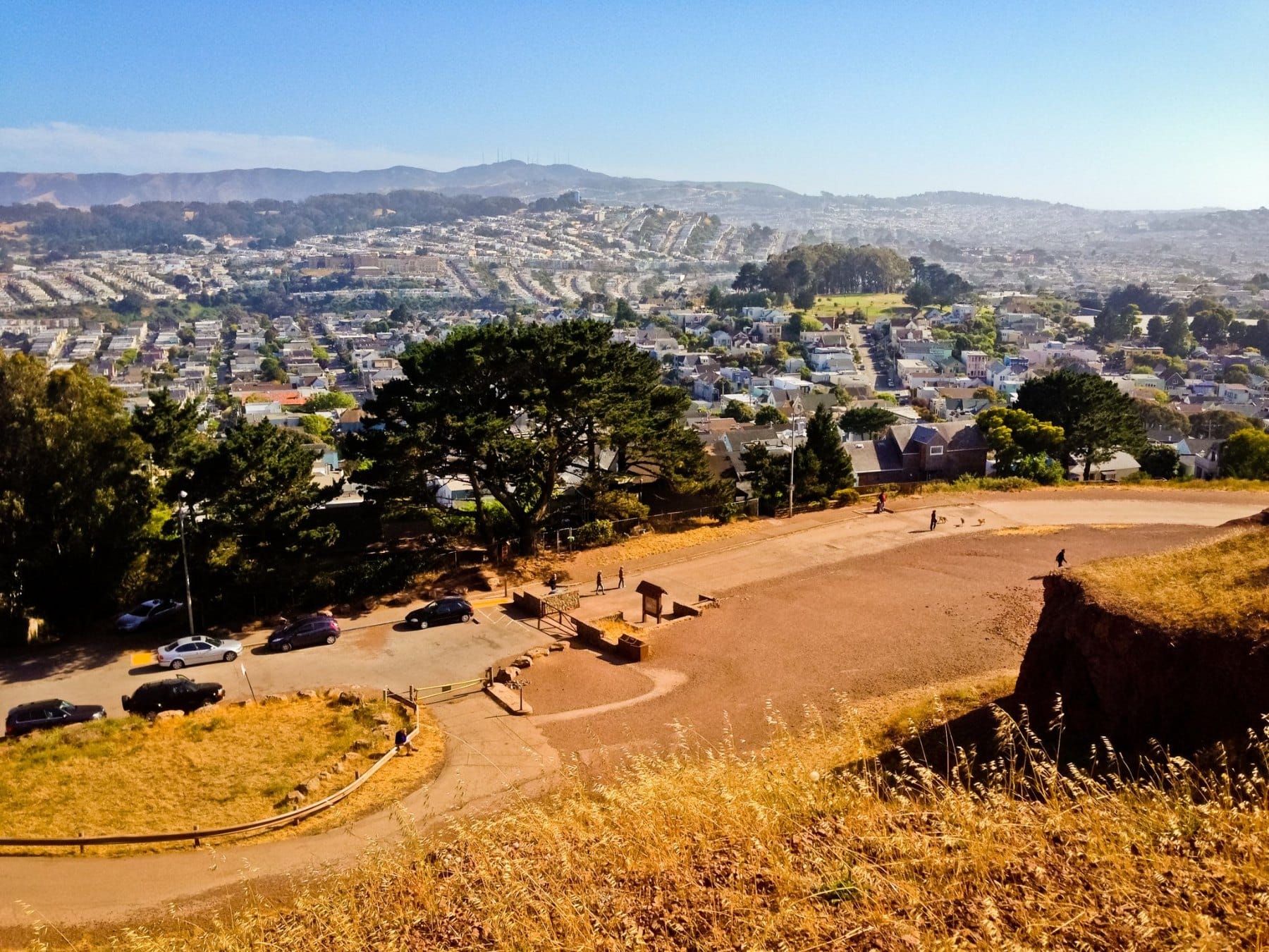 Looking south from the path on Bernal Hill over the southern neighborhoods toward San Bruno Mountain