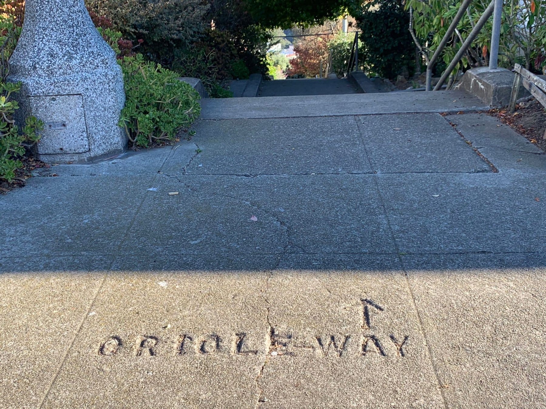 Oriole Way stamped into a Golden Gate Heights stairway path