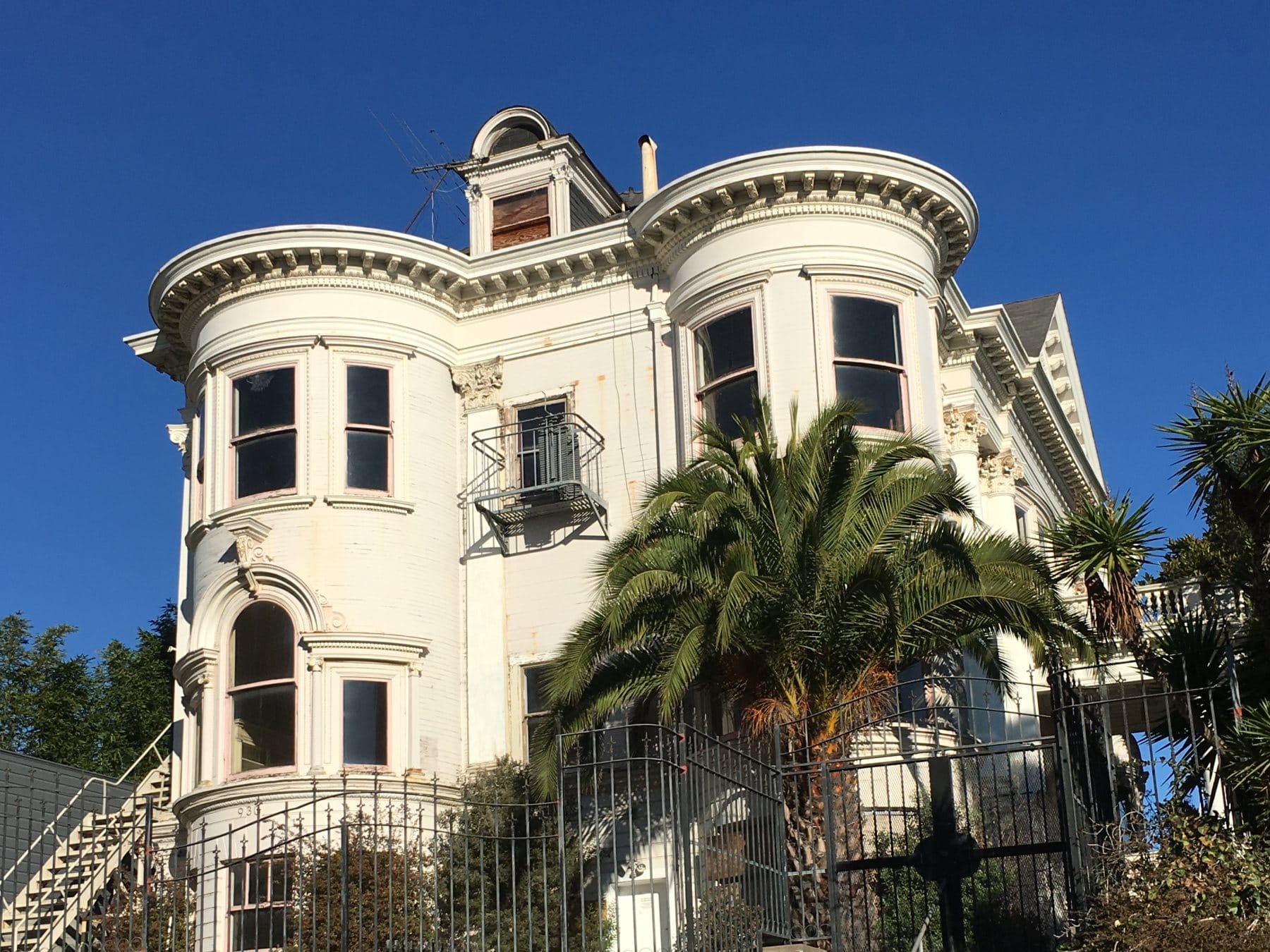 White Victorian above the sidewalk in Hayes Valley
