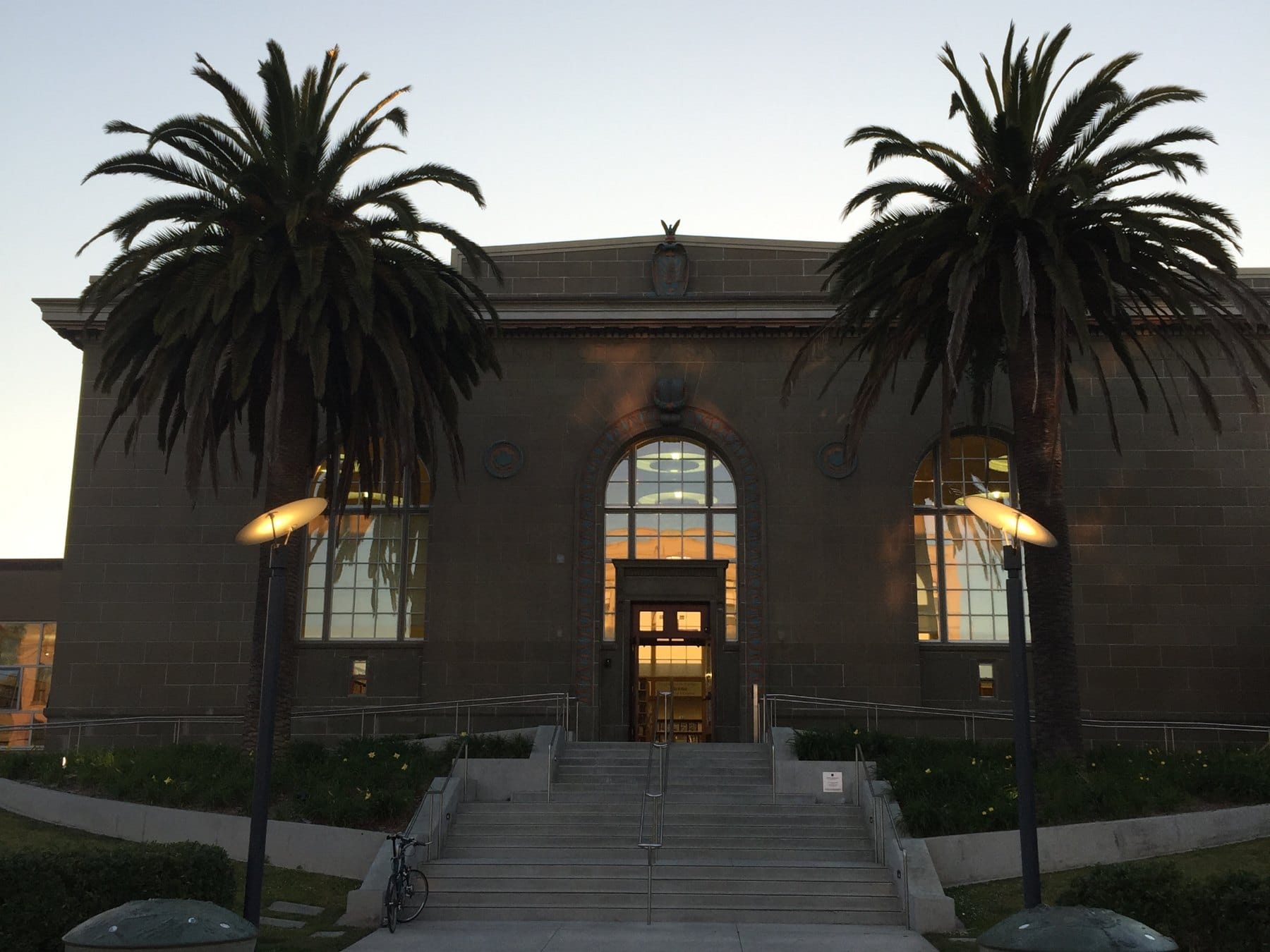 The Richmond Branch Library on Ninth Avenue with palm trees