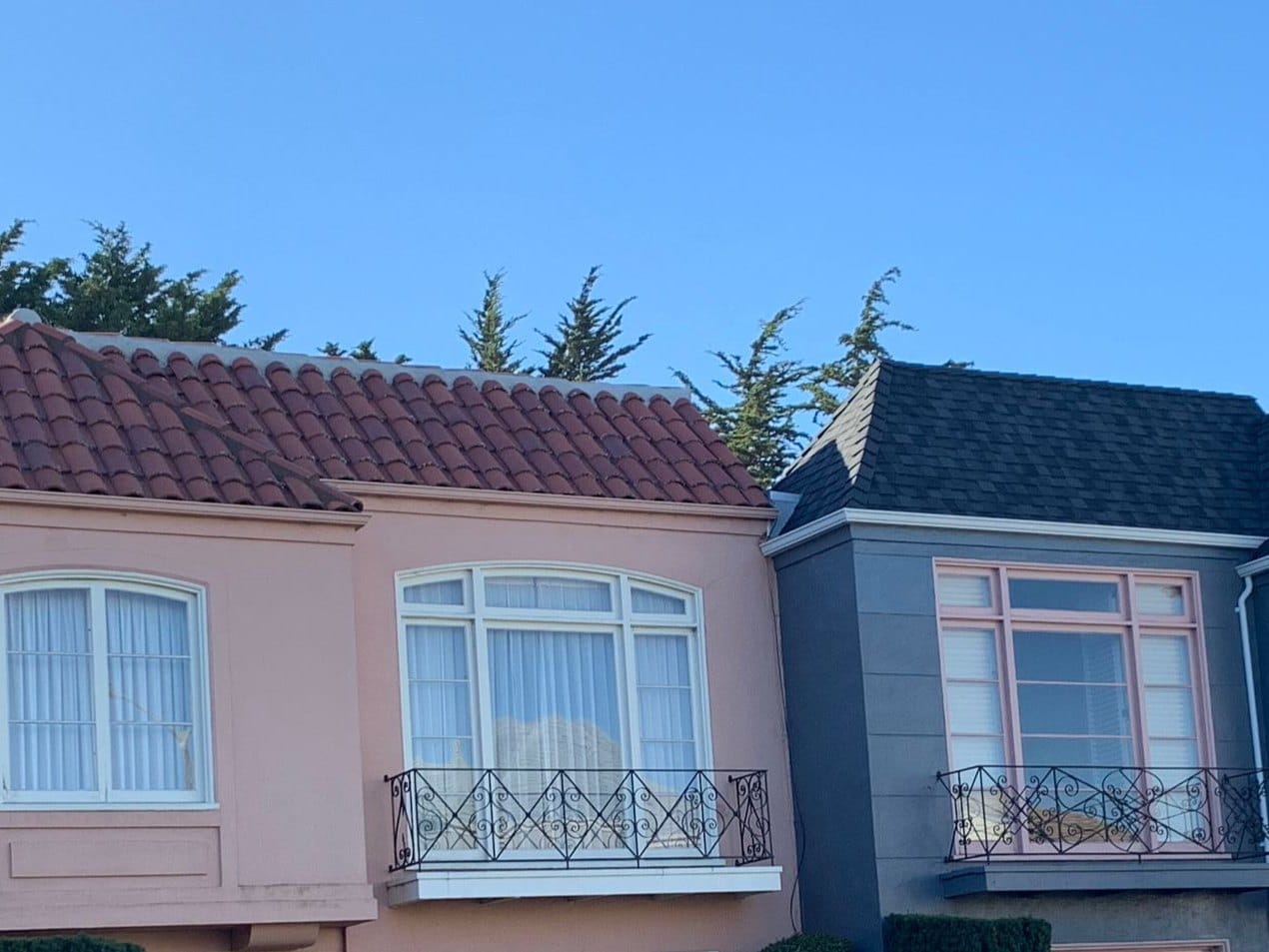 Colorful homes with tile roofs on Ewing Terrace