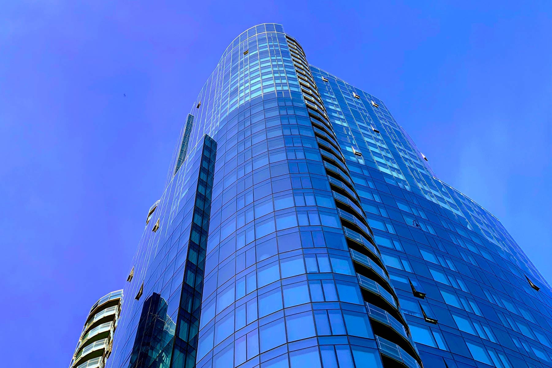 One of Lumina’s curved glass towers