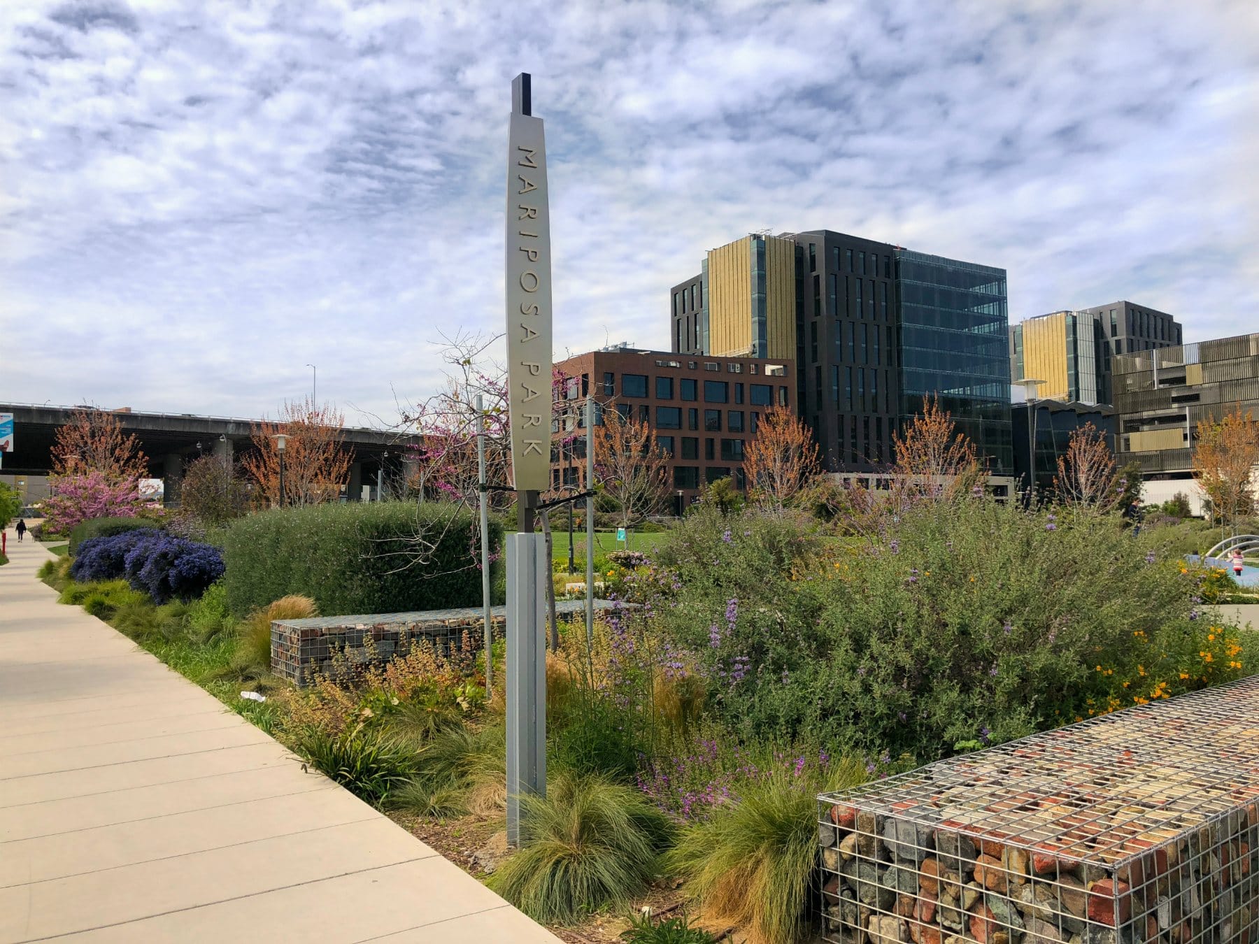 Park path with UCSF Mission Bay buildings behind