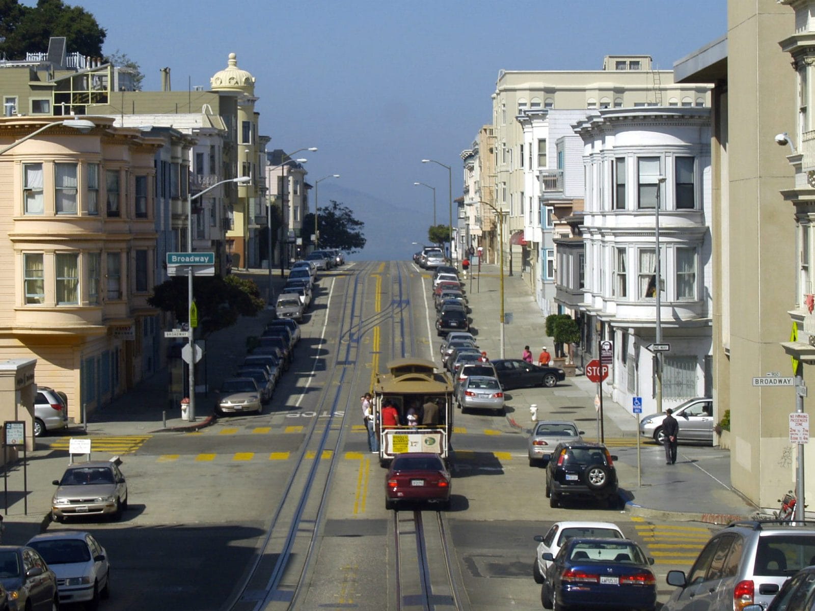 A cable car climbing a Nob Hill street
