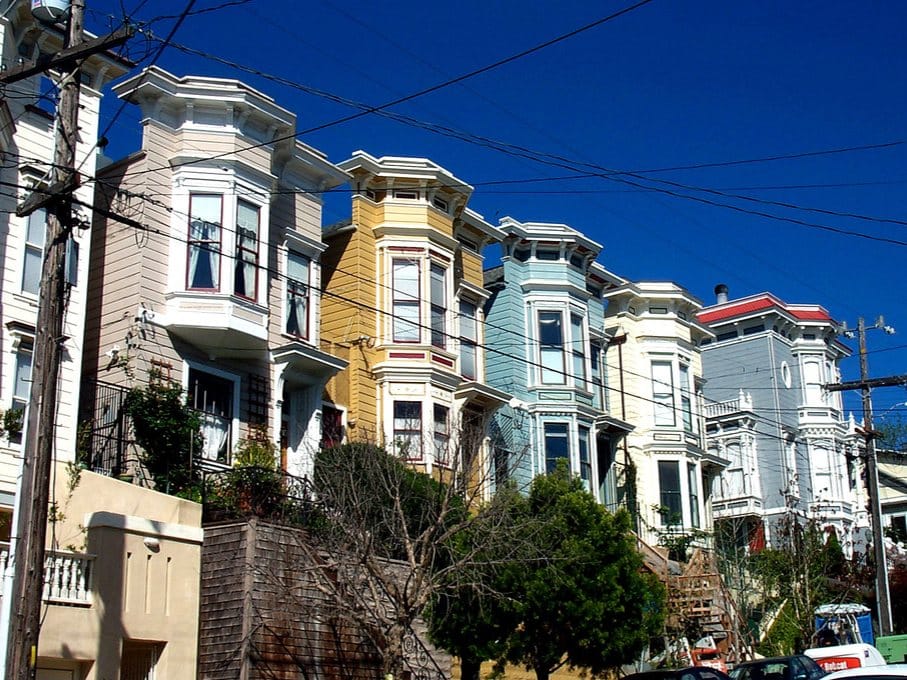 Painted Victorian row houses on a Noe Valley hillside