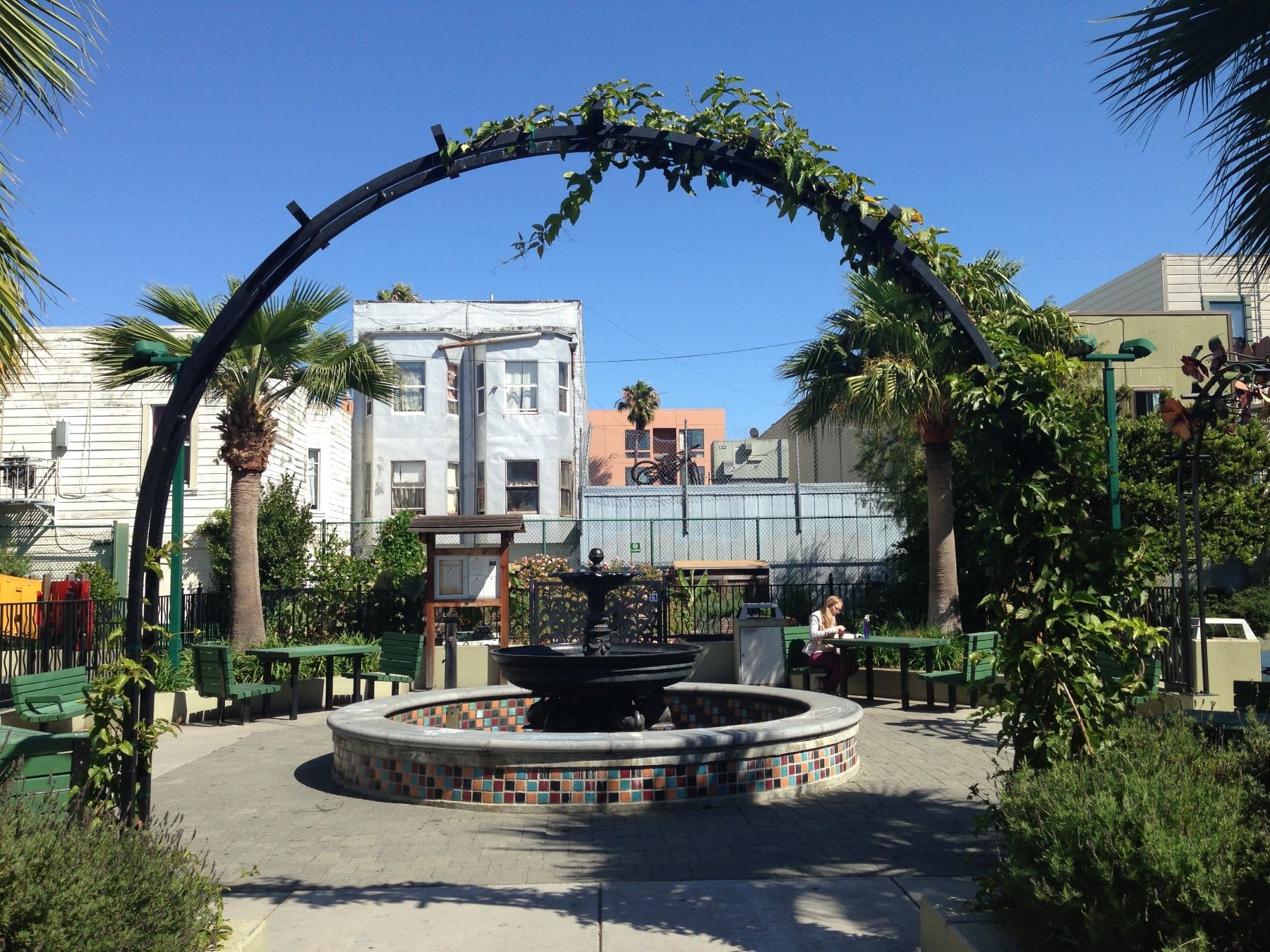 Arched trellis and fountain at Kid Power Park on Hoff Street