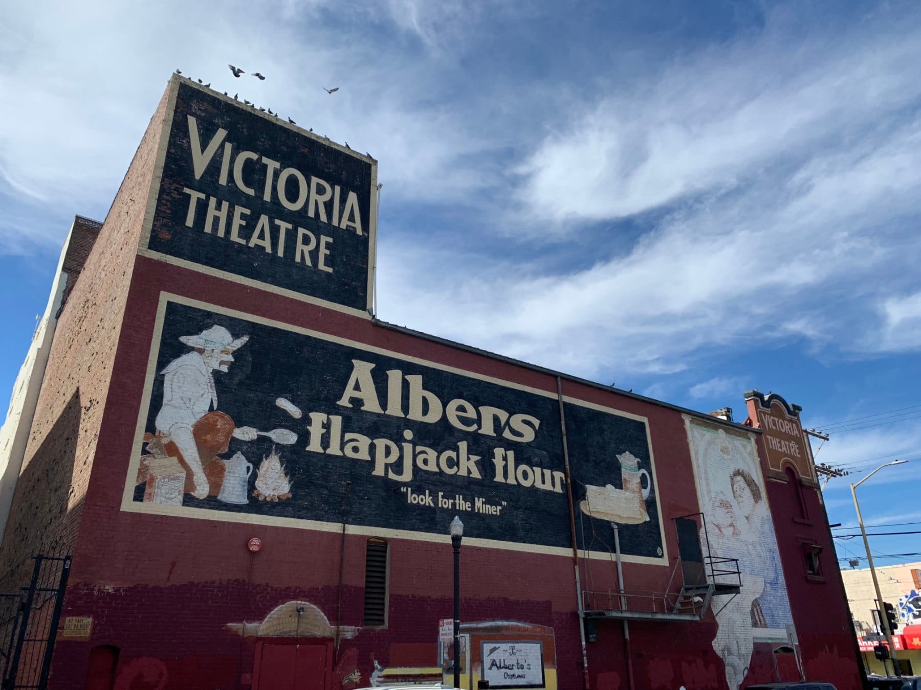 The Victoria Theatre sign and painted Albers Flapjack Flour ad on 16th Street