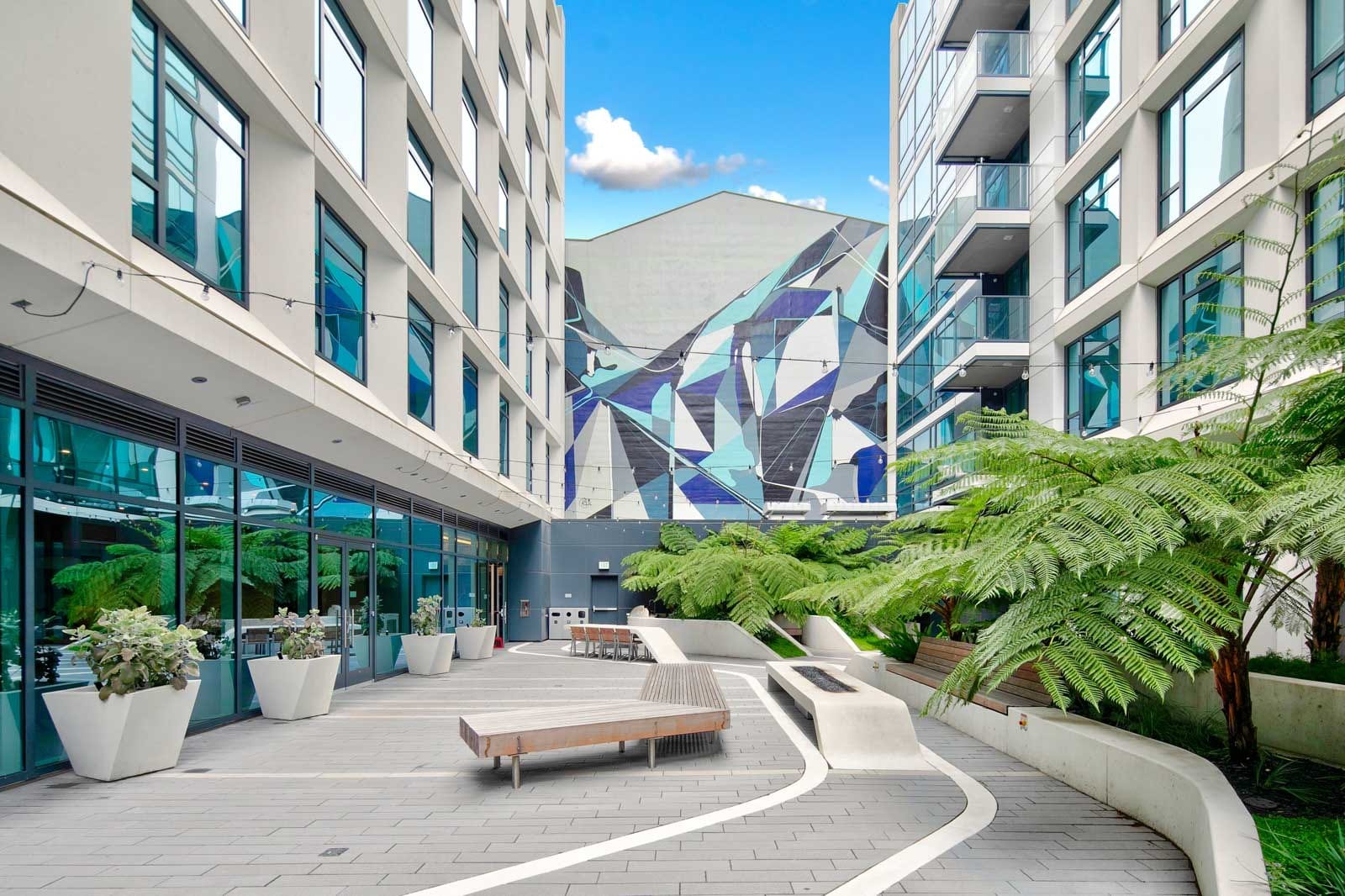 The landscaped courtyard between the East and West towers at The Rockwell