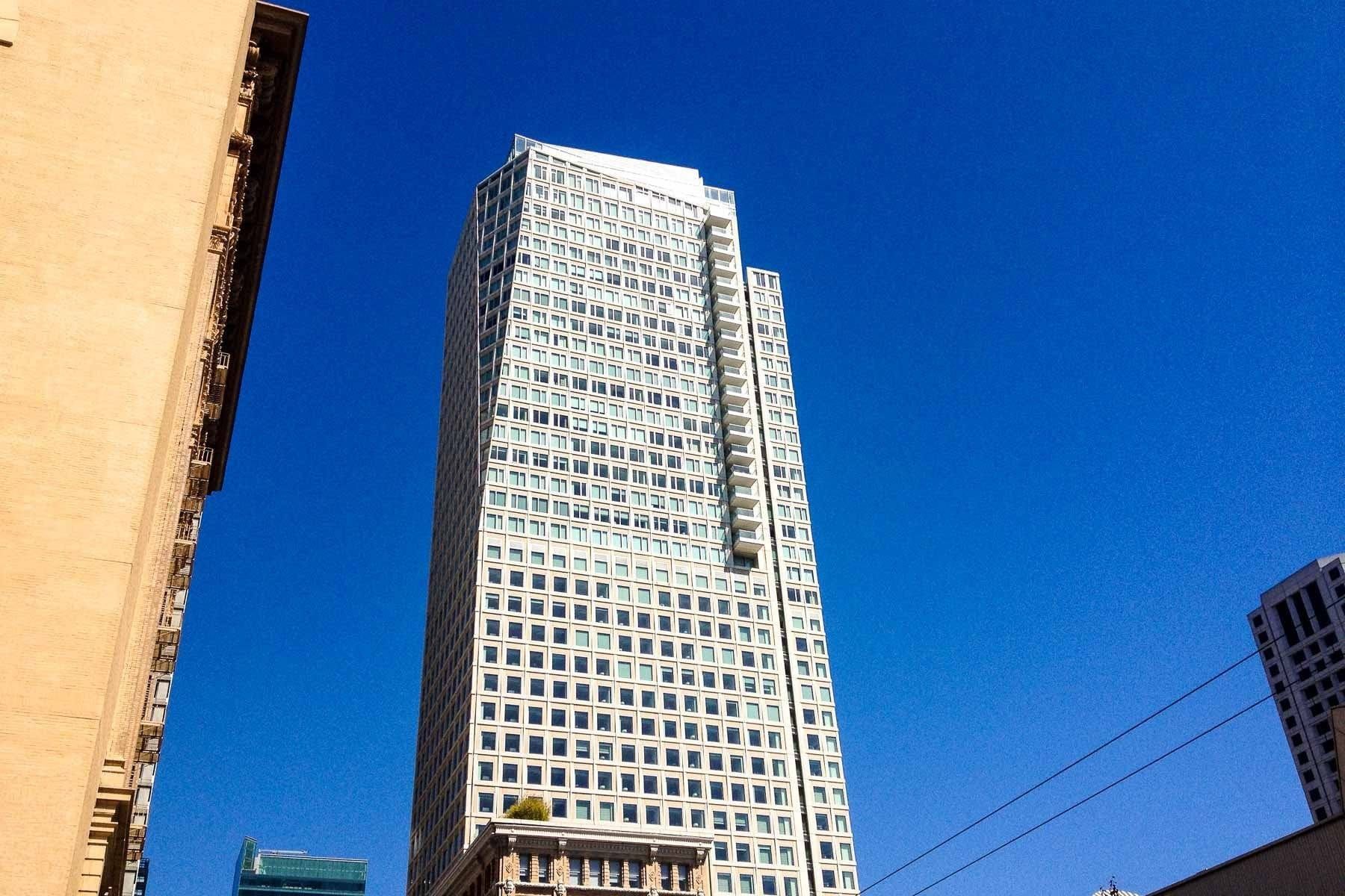 The St. Regis tower in Yerba Buena against a blue sky