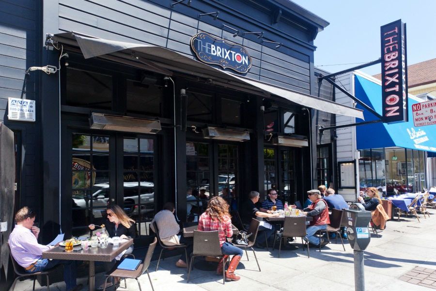 Sidewalk tables outside a restaurant on Union Street in Cow Hollow