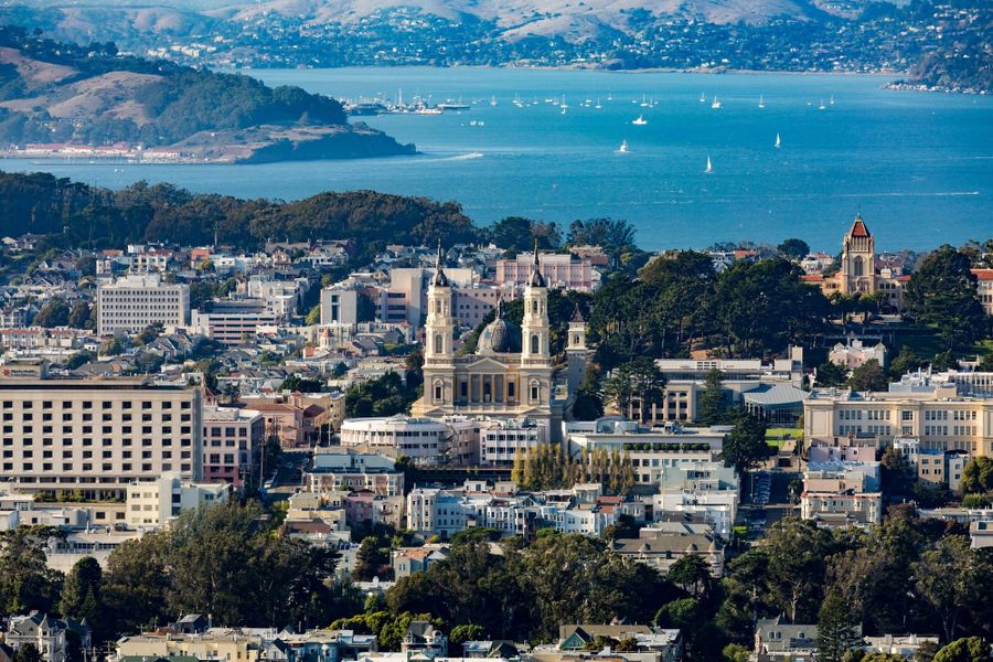 St. Ignatius Church at USF seen from Twin Peaks, with the bay beyond