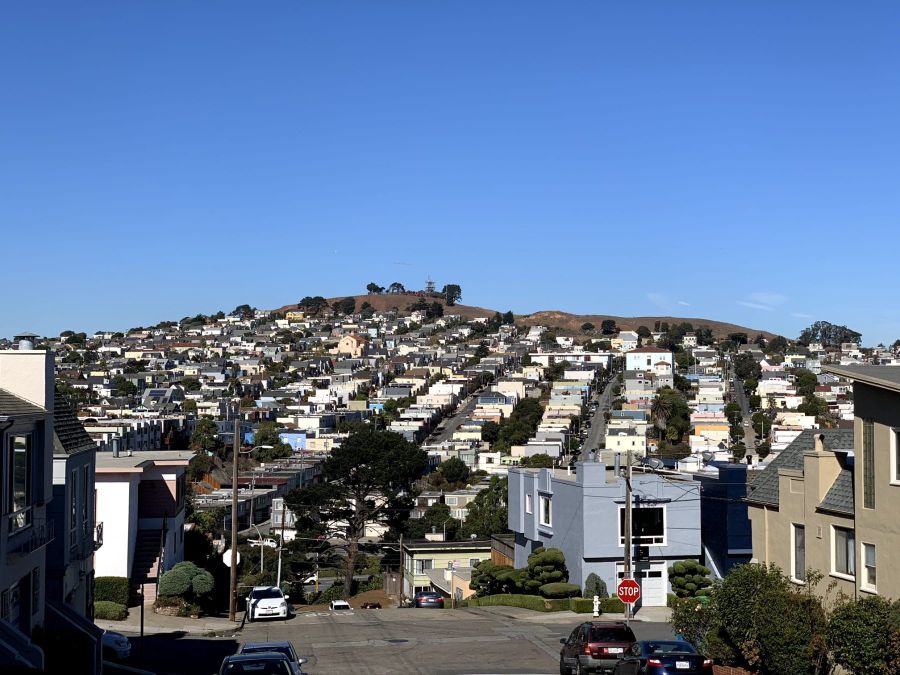 Portola rooftops looking north toward Bernal Hill