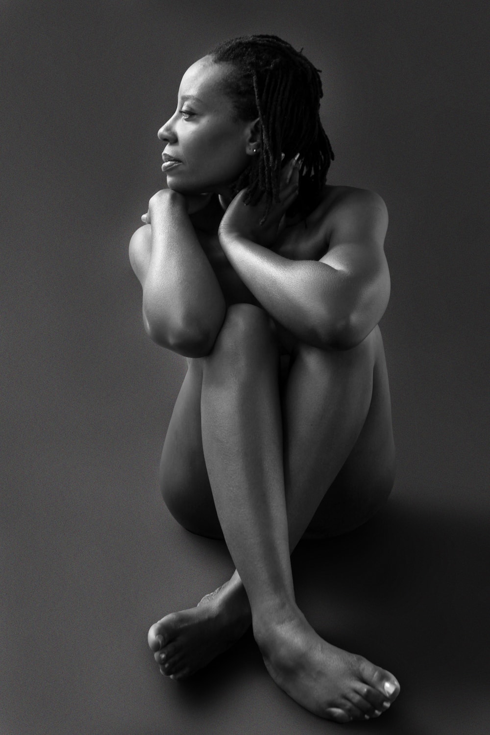 This is a black and white photo of Melissa in a studio shoot