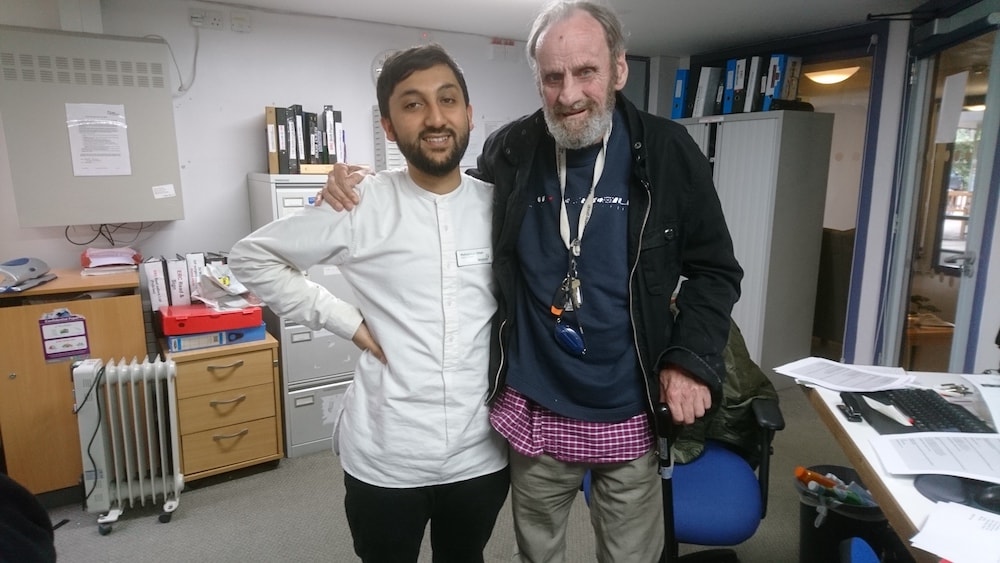 This is a photo of Mohammad with a resident of Ester Randall Court