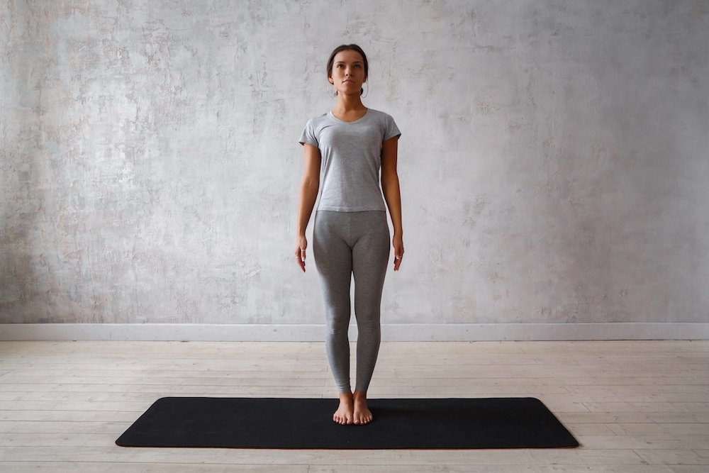 This is a photo of a lady doing the mountain pose