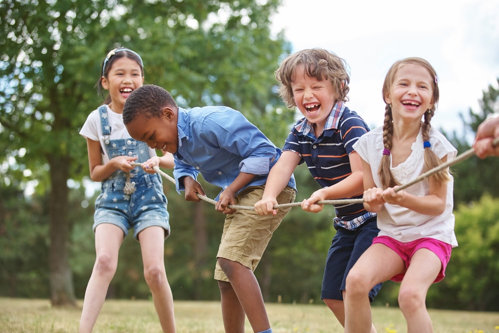 Children play tug of war
