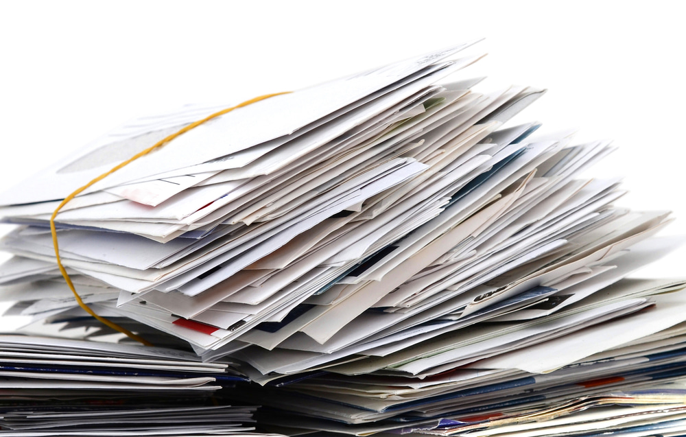 This is aphoto if a stack of letters