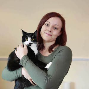 Layla the cat and owner Cody